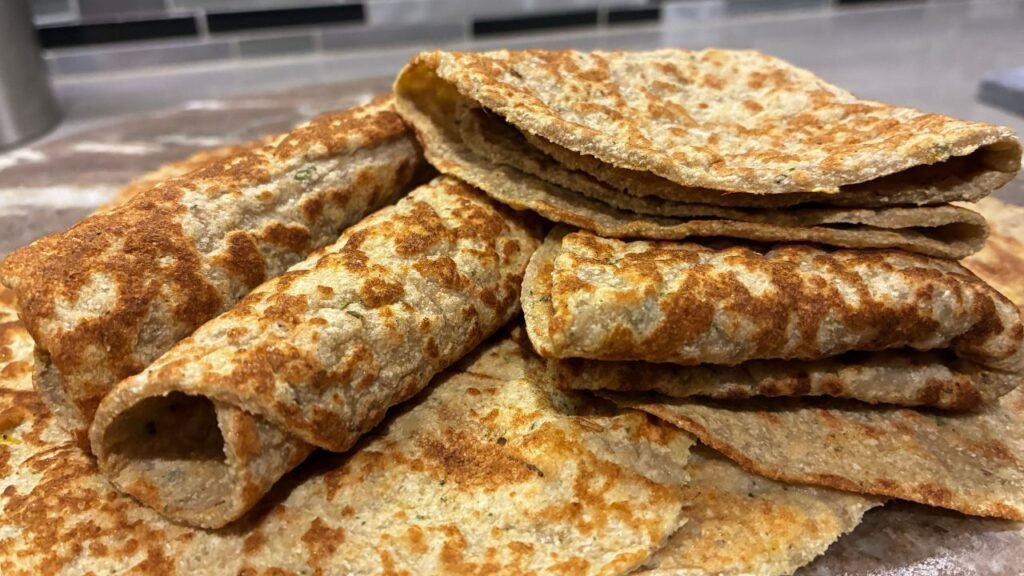 Tortillas maison à la purée de potiron, souples et dorées, préparées avec farine de coco et psyllium, version sans gluten et low‑carb.
